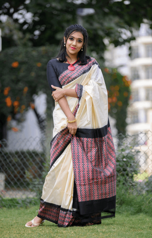 Black and Red ikkat weave both Sides border Saree