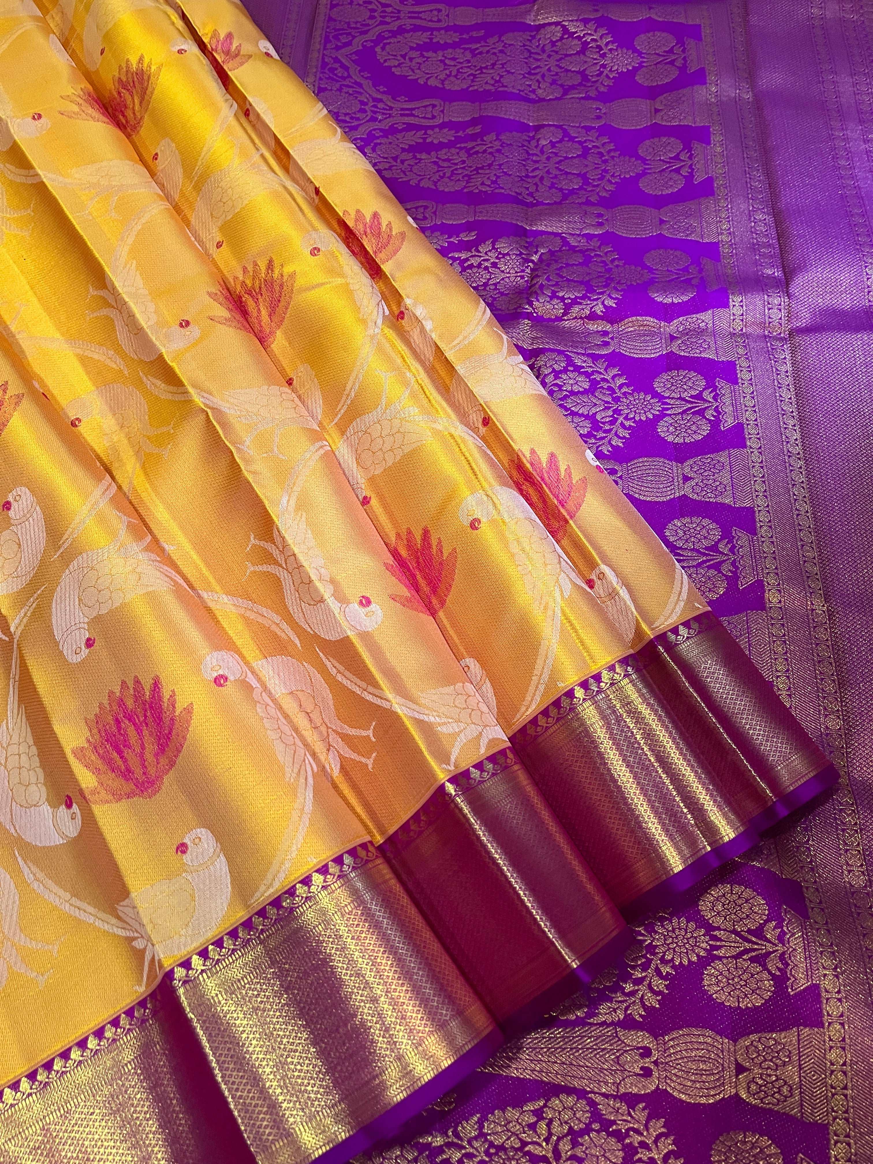 Bavanji border rich and detailed gold zari paisleys on orchid purple pallu Kanjivaram silk saree